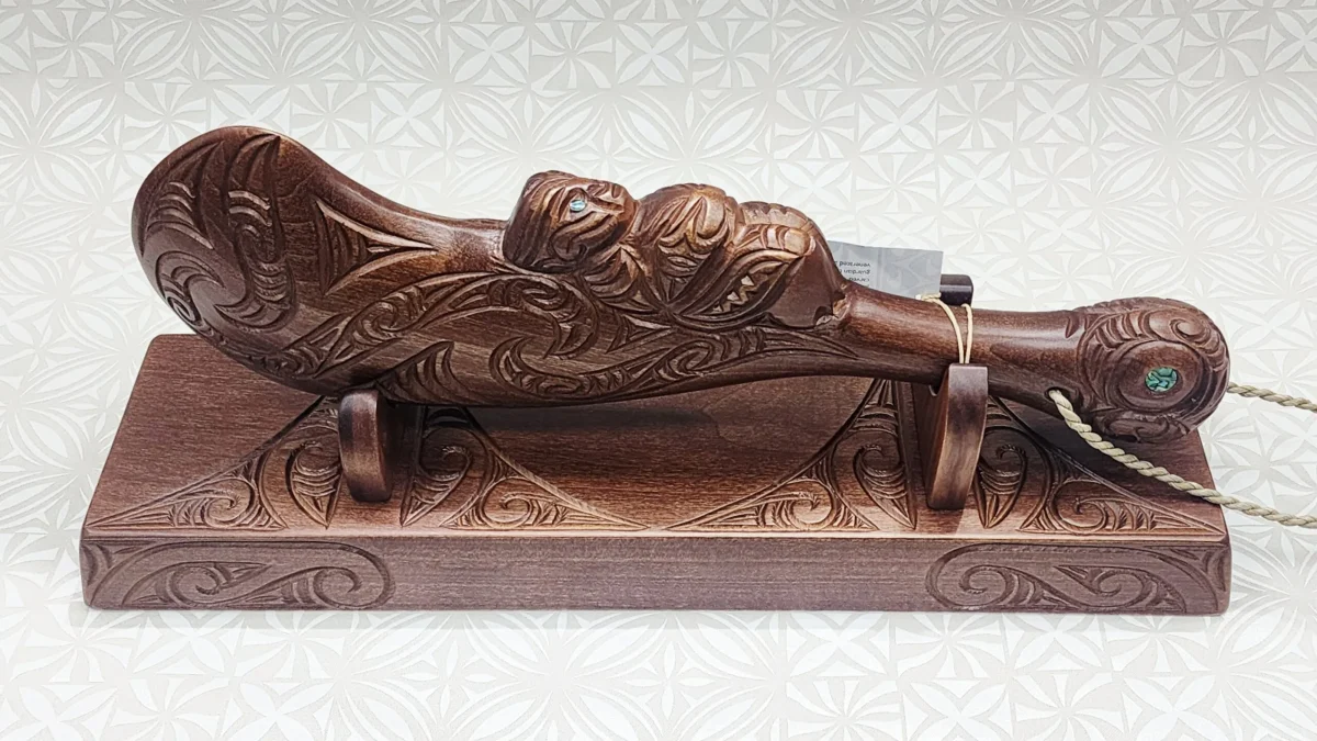 Large Hand-Carved Māori Wahaika Club on Display Stand – Made in New Zealand