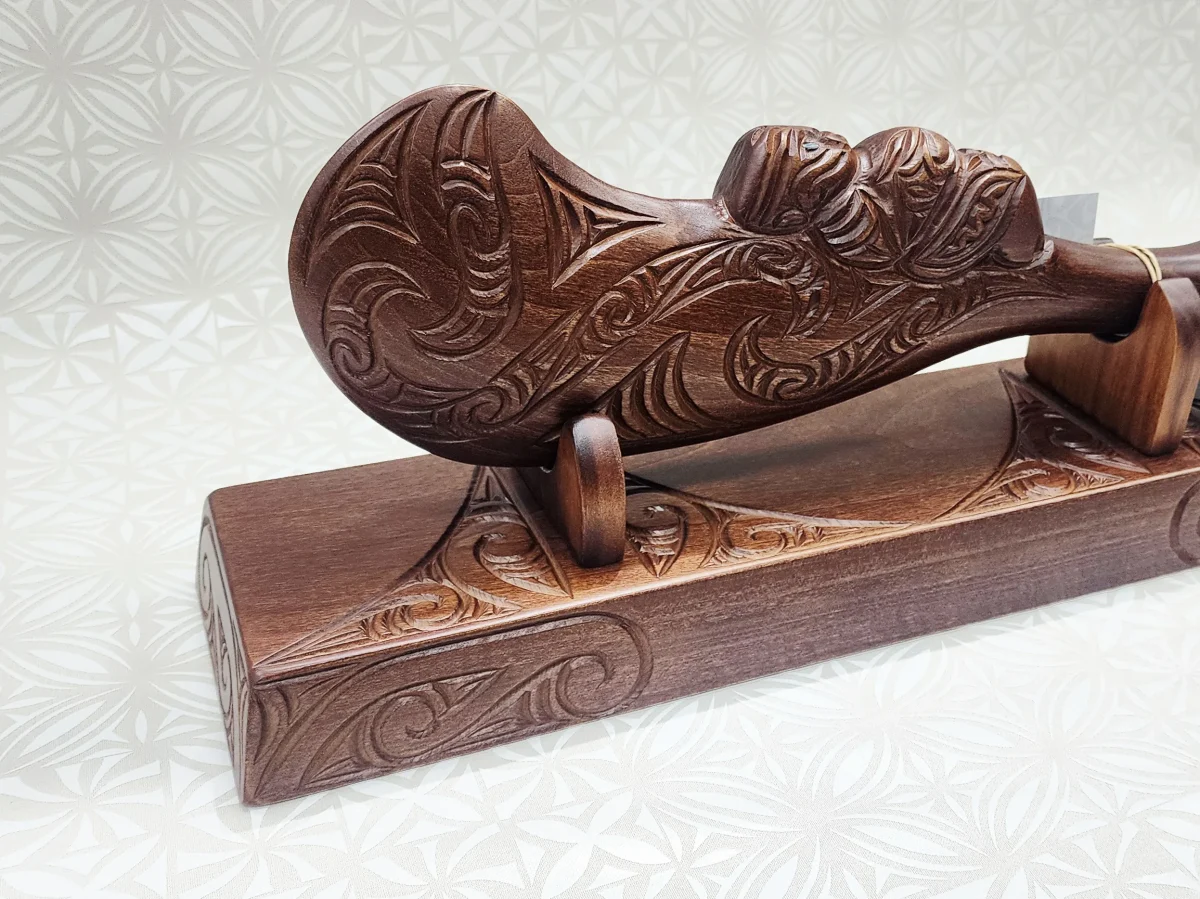 Large Hand-Carved Māori Wahaika Club on Display Stand – Made in New Zealand
