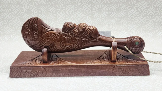 Large Hand-Carved Māori Wahaika Club on Display Stand – Made in New Zealand