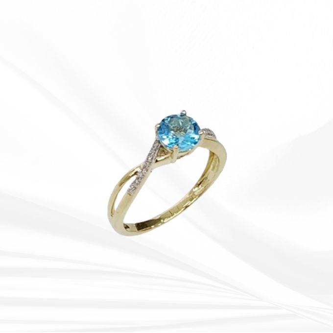 Round Blue Topaz Crossover Ring