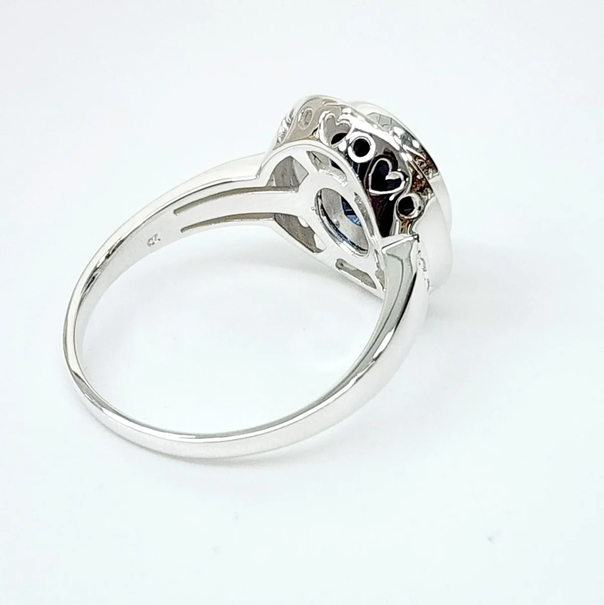Sterling Silver 10mm x 13mm Ocal Cut Bezel Set Blue CZ and Halo CZ Setting Ladies Dress Ring