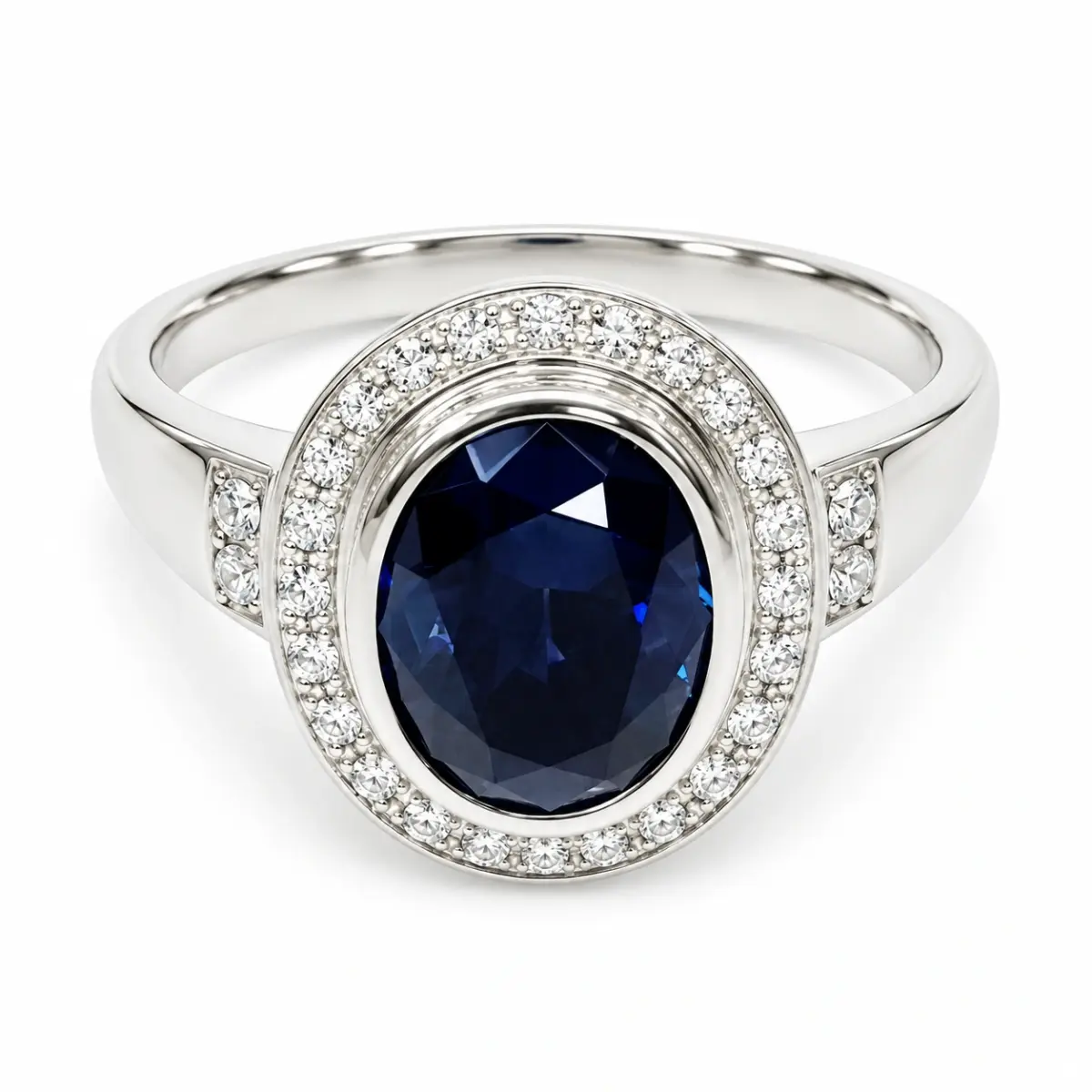 Sterling Silver 10mm x 13mm Ocal Cut Bezel Set Blue CZ and Halo CZ Setting Ladies Dress Ring