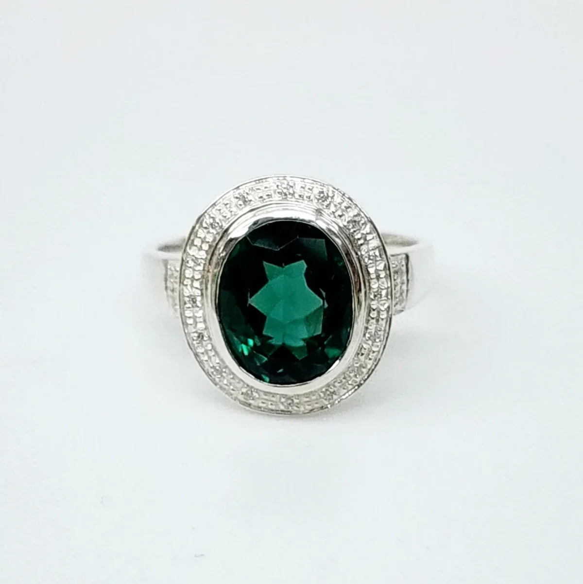 Sterling Silver 10mm x 13mm Ocal Cut Bezel Set Green CZ and Halo CZ Setting Ladies Dress Ring
