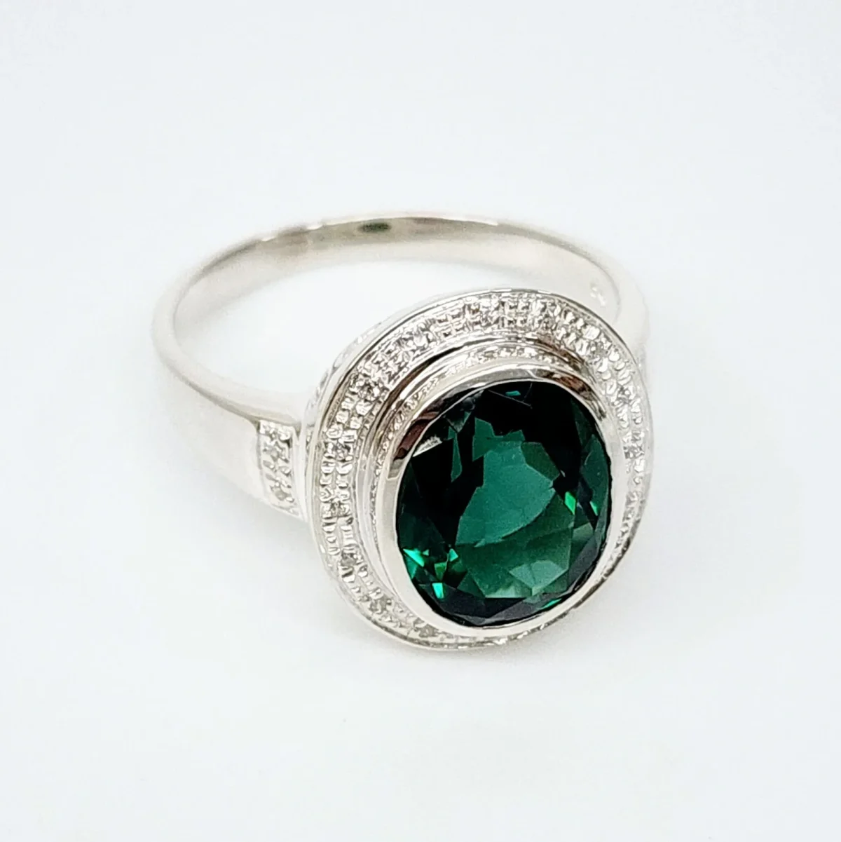 Sterling Silver 10mm x 13mm Ocal Cut Bezel Set Green CZ and Halo CZ Setting Ladies Dress Ring