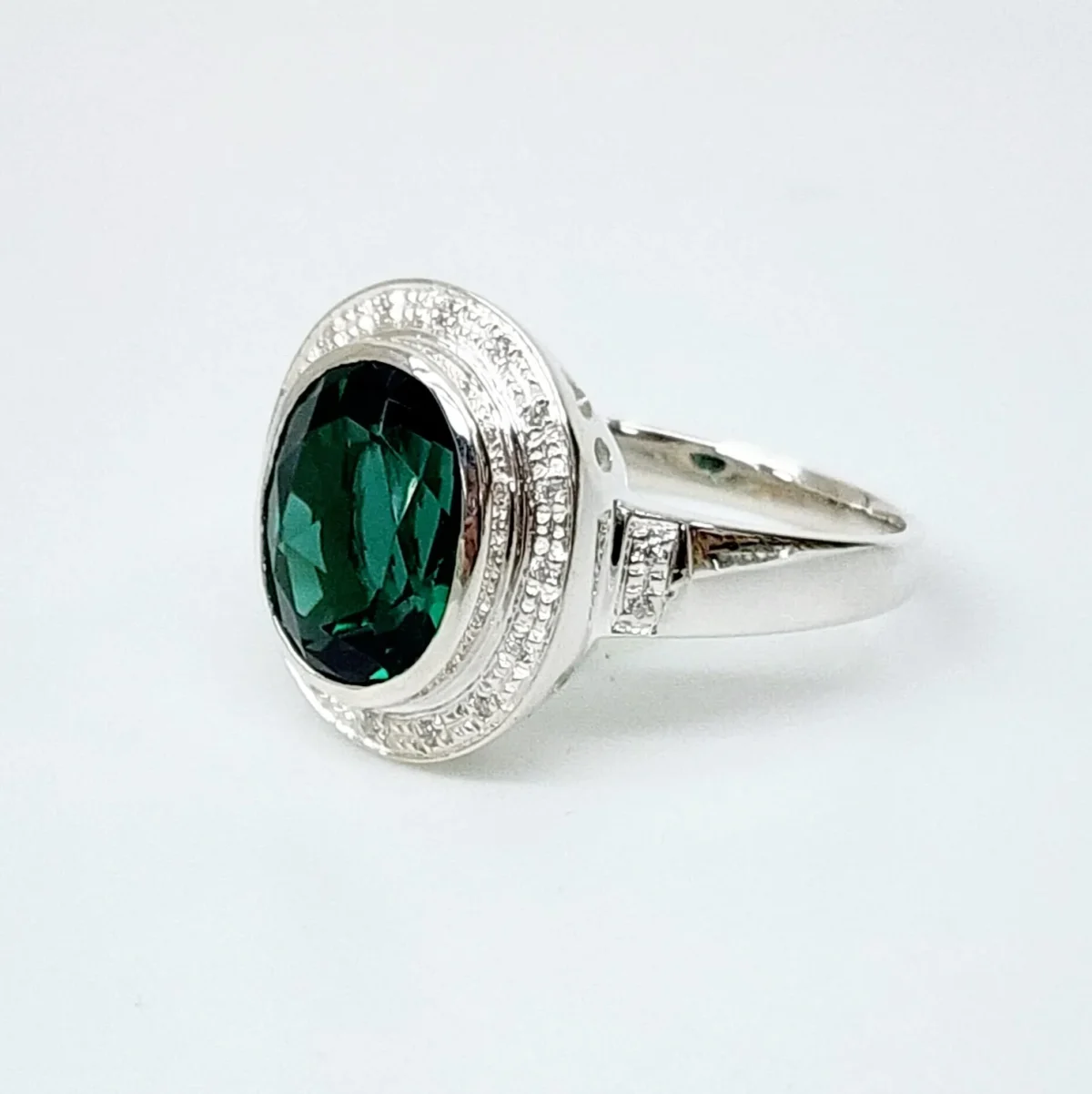 Sterling Silver 10mm x 13mm Ocal Cut Bezel Set Green CZ and Halo CZ Setting Ladies Dress Ring