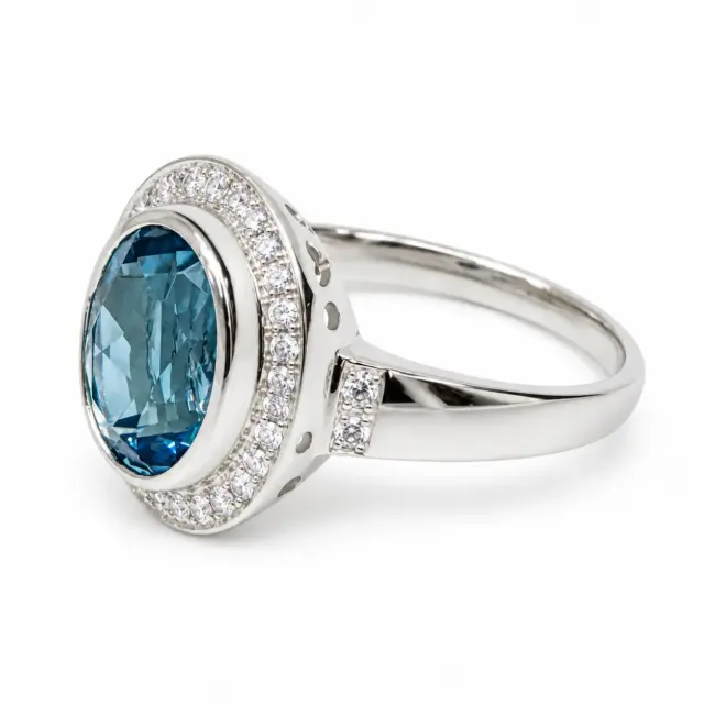 Sterling Silver 10mm x 13mm Ocal Cut Bezel Set Topaz CZ and Halo CZ Setting Ladies Dress Ring