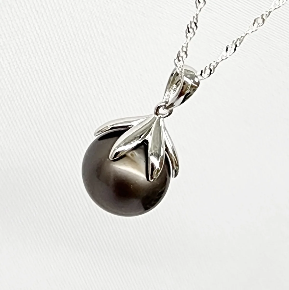 Sterling Silver 12.00mm Round Cook Island Black Pearl Pendant with Sterling Silver 6 Claw Cap