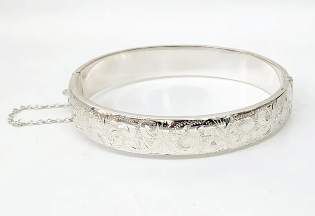Sterling Silver 13mm Wide Engraved / Plain Hinged Oval Bangle with Safety Chain 69mm x 63mm