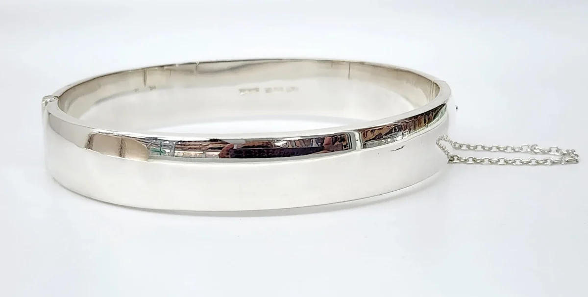 Sterling Silver 13mm Wide Engraved / Plain Hinged Oval Bangle with Safety Chain 69mm x 63mm