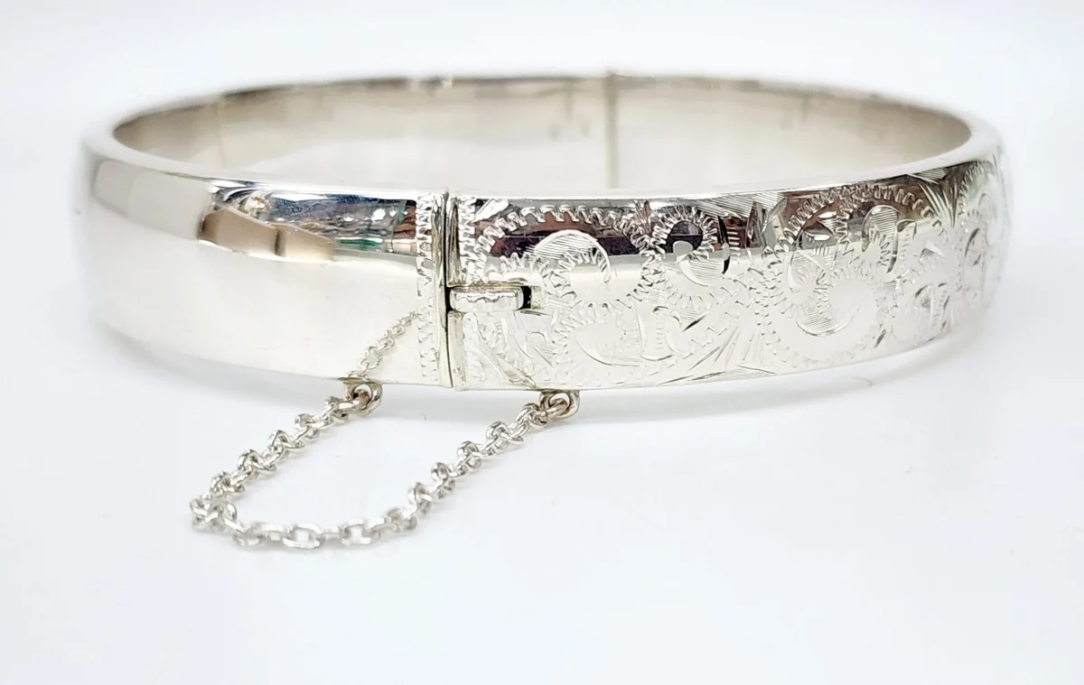 Sterling Silver 13mm Wide Engraved / Plain Hinged Oval Bangle with Safety Chain 69mm x 63mm