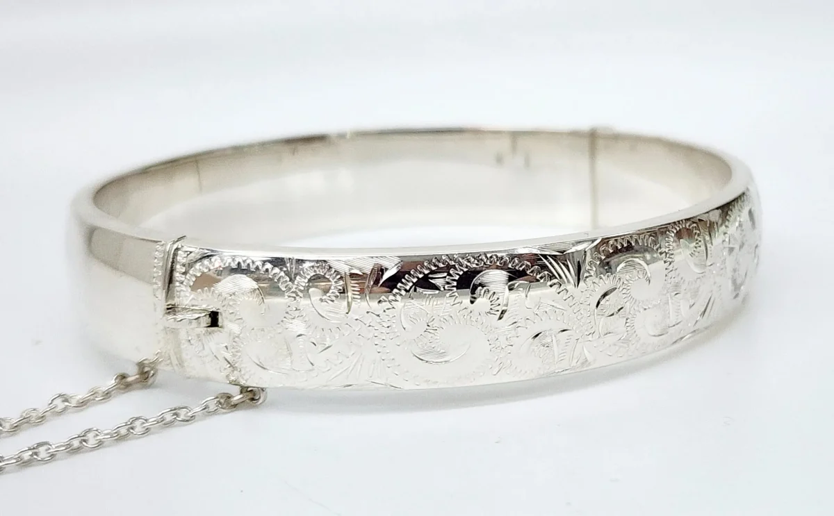 Sterling Silver 13mm Wide Engraved / Plain Hinged Oval Bangle with Safety Chain 69mm x 63mm