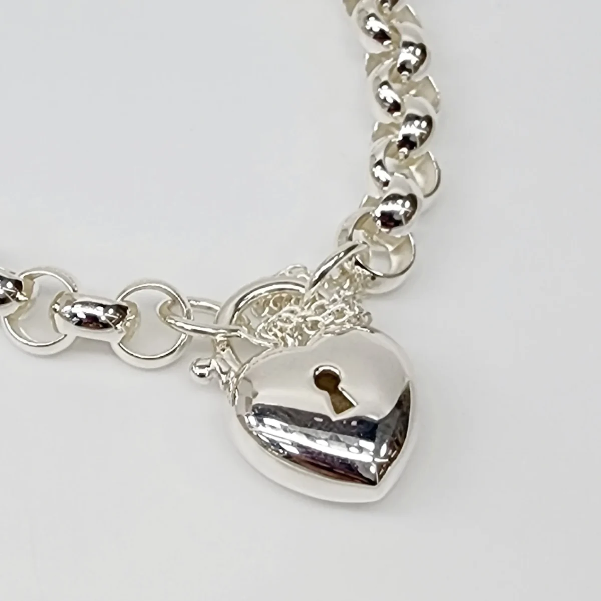 Sterling Silver 23cm Belcher Bracelet With Puff Heart Padlock