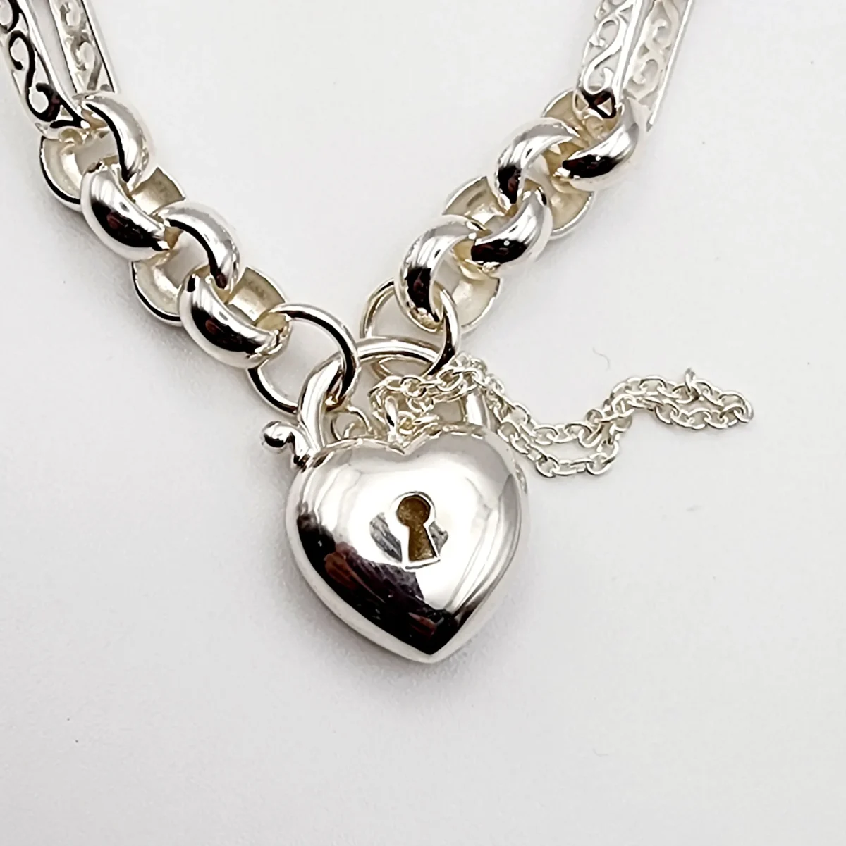Sterling Silver 23cm Figaro Belcher Bracelet With Puff Heart Padlock