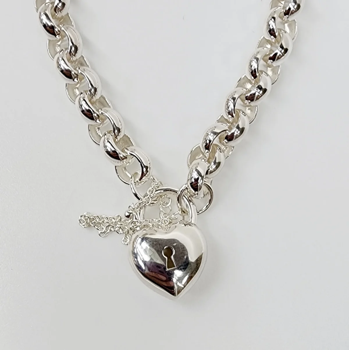 Sterling Silver 23cm Belcher Bracelet With Puff Heart Padlock