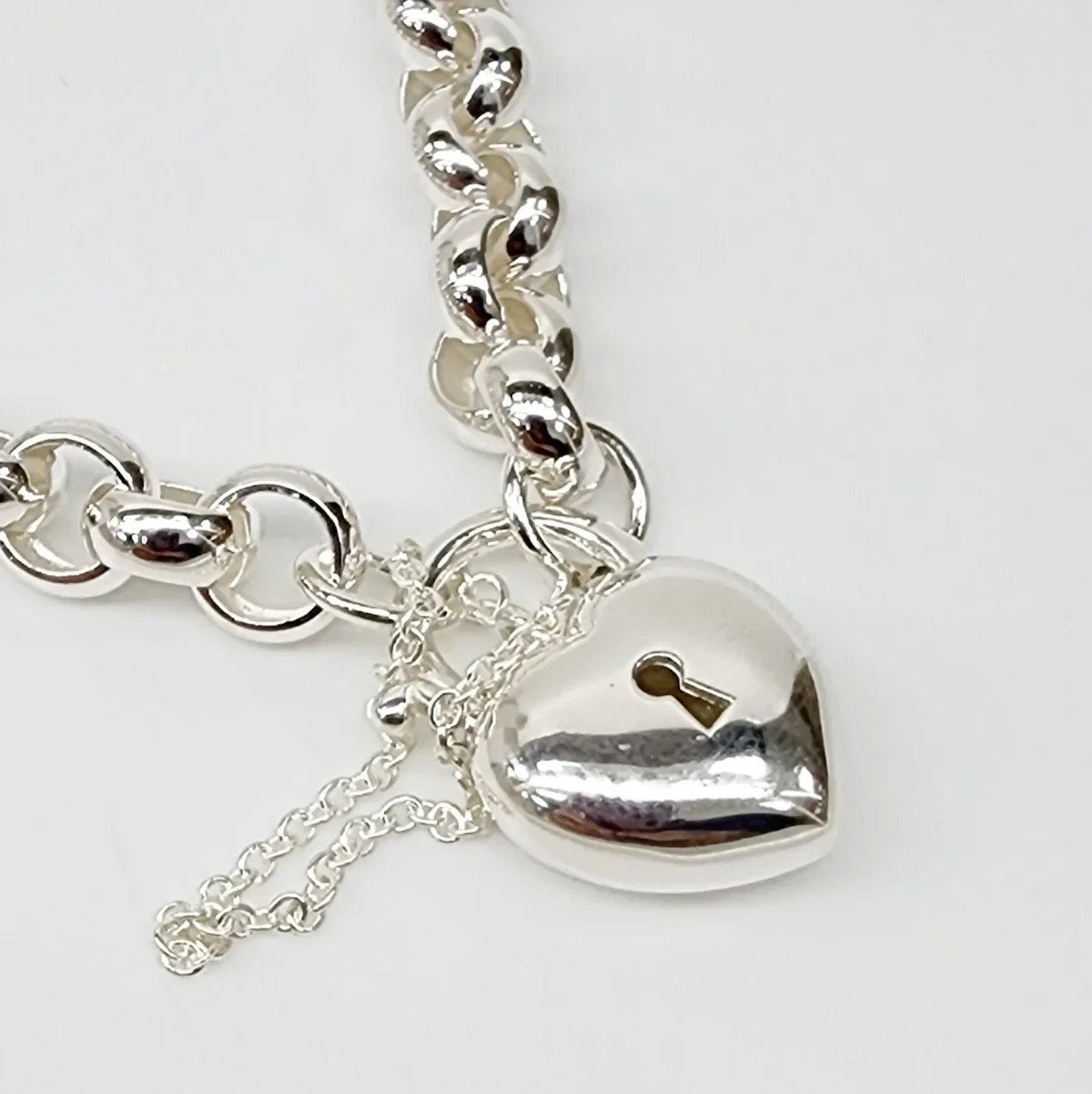 Sterling Silver 23cm Belcher Bracelet With Puff Heart Padlock