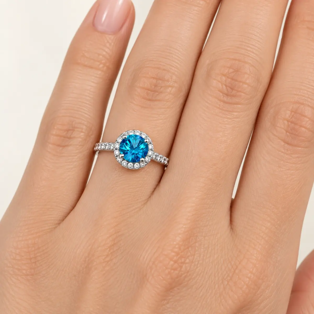 Sterling Silver Blue Topaz Colour CZ Halo Ring – 6mm Round Centre Stone - PT2020