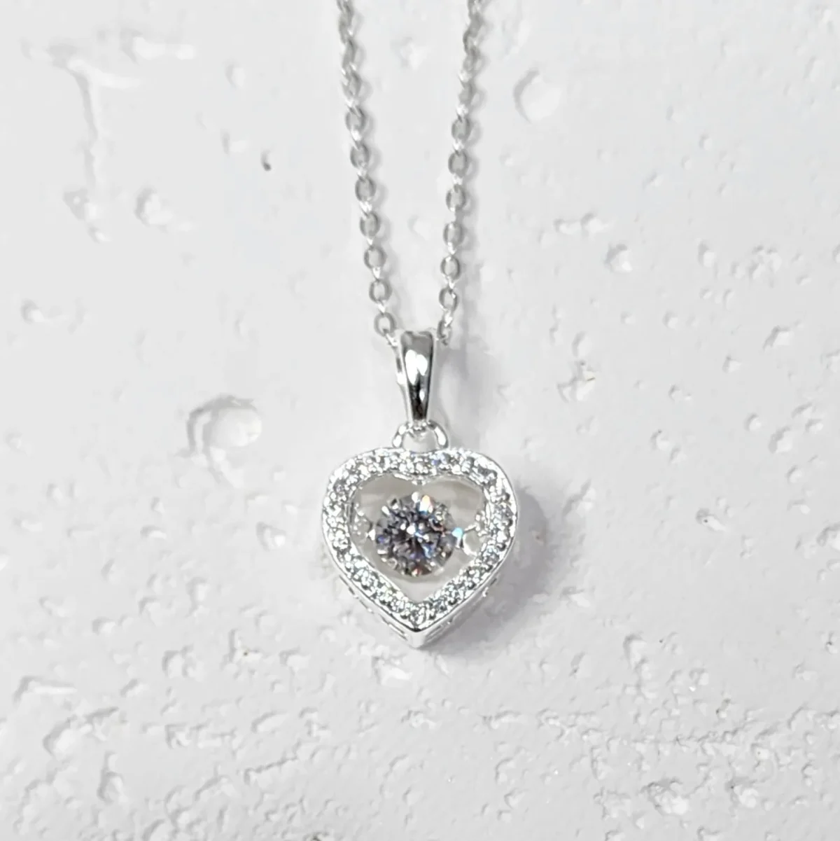 Sterling Silver Brilliant-Cut Moving Center Cubic Zirconia Heart Pendant and Sterling Silver Chain