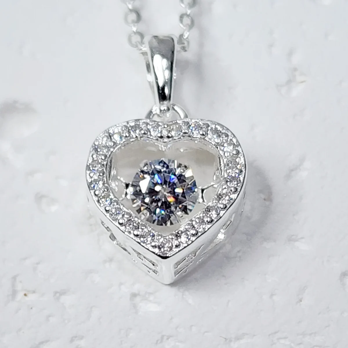 Sterling Silver Brilliant-Cut Moving Center Cubic Zirconia Heart Pendant and Sterling Silver Chain