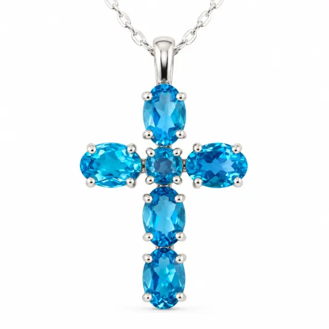 Sterling Silver Cross Pendant with Blue Topaz Setting - SC11