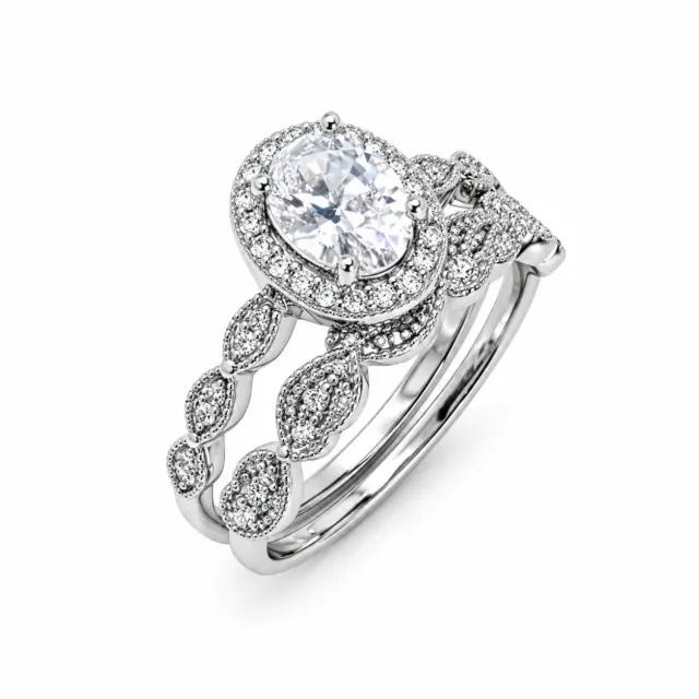 Sterling Silver Oval Shaped Halo 2 Piece Cubic Zirconia Bridal Set