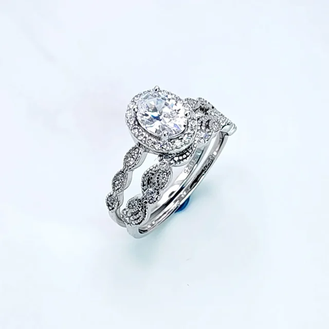 Sterling Silver Oval Shaped Halo 2 Piece Cubic Zirconia Bridal Set