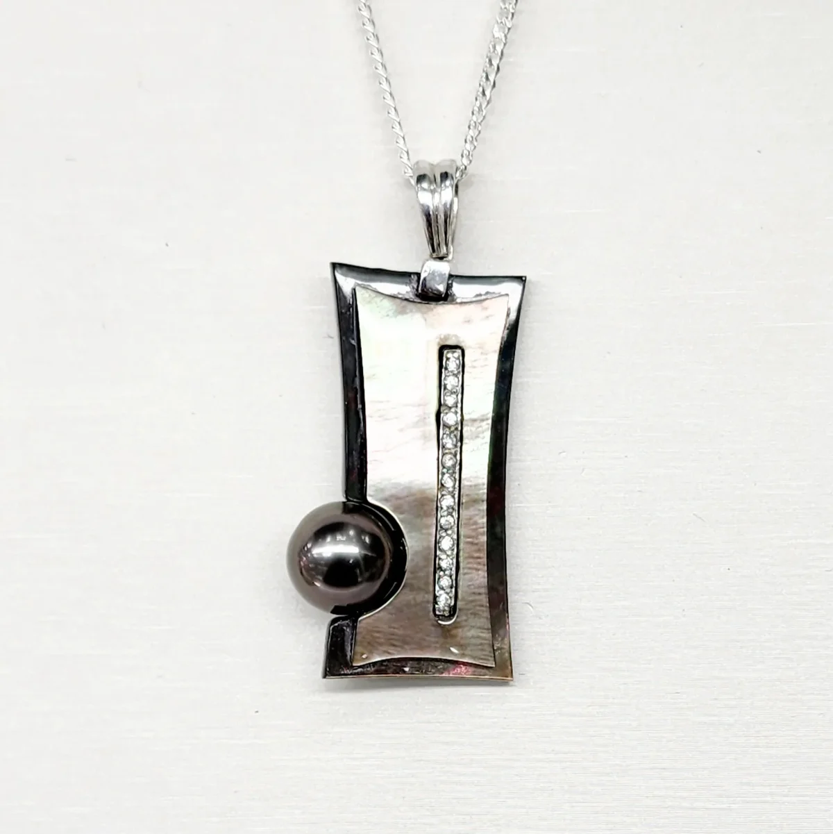 Sterling Silver Pendant with Cubic Zirconia Setting and 10mm Tahitian Black Pearl and Dark Mother Of Pearl Shell