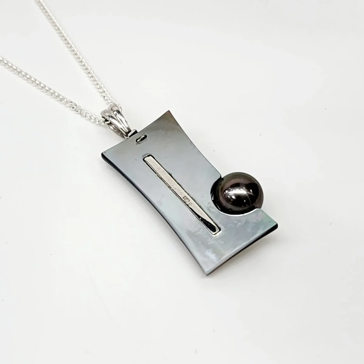Sterling Silver Pendant with Cubic Zirconia Setting and 10mm Tahitian Black Pearl and Dark Mother Of Pearl Shell