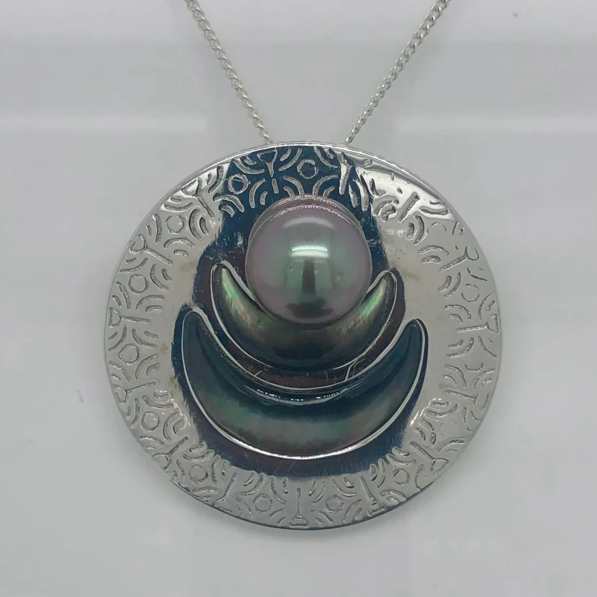 Sterling Silver Round Engraved Tahitian Design with 11mm-12mm Tahitian Black Pearl and Dark Mother Of Pearl Shell Inlay