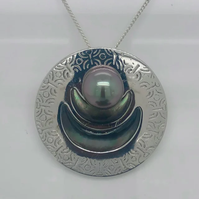 Sterling Silver Round Engraved Tahitian Design with 11mm-12mm Tahitian Black Pearl and Dark Mother Of Pearl Shell Inlay