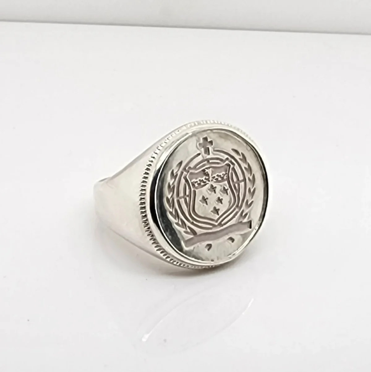 Sterling Silver Samoan Sila Coin Ring with Solid Ring Mount