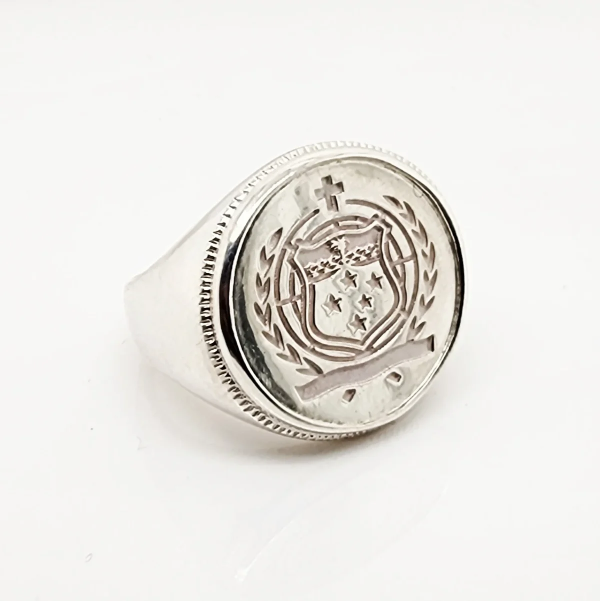 Sterling Silver Samoan Sila Coin Ring with Solid Ring Mount