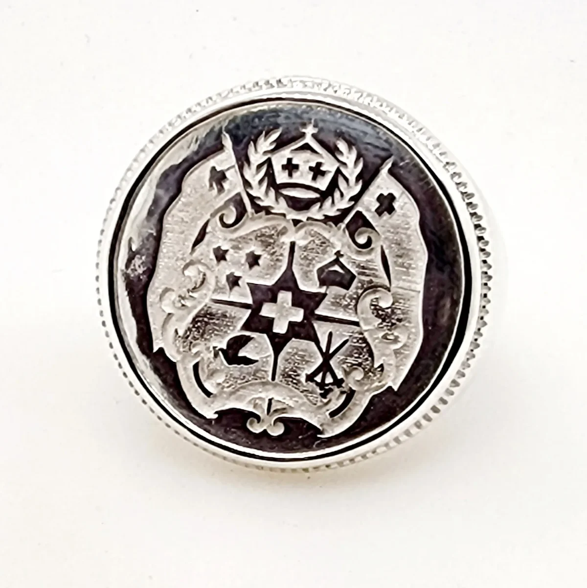 Sterling Silver Tongan Sila Coin Ring with Solid Ring Mount