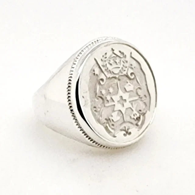 Sterling Silver Tongan Sila Coin Ring with Solid Ring Mount