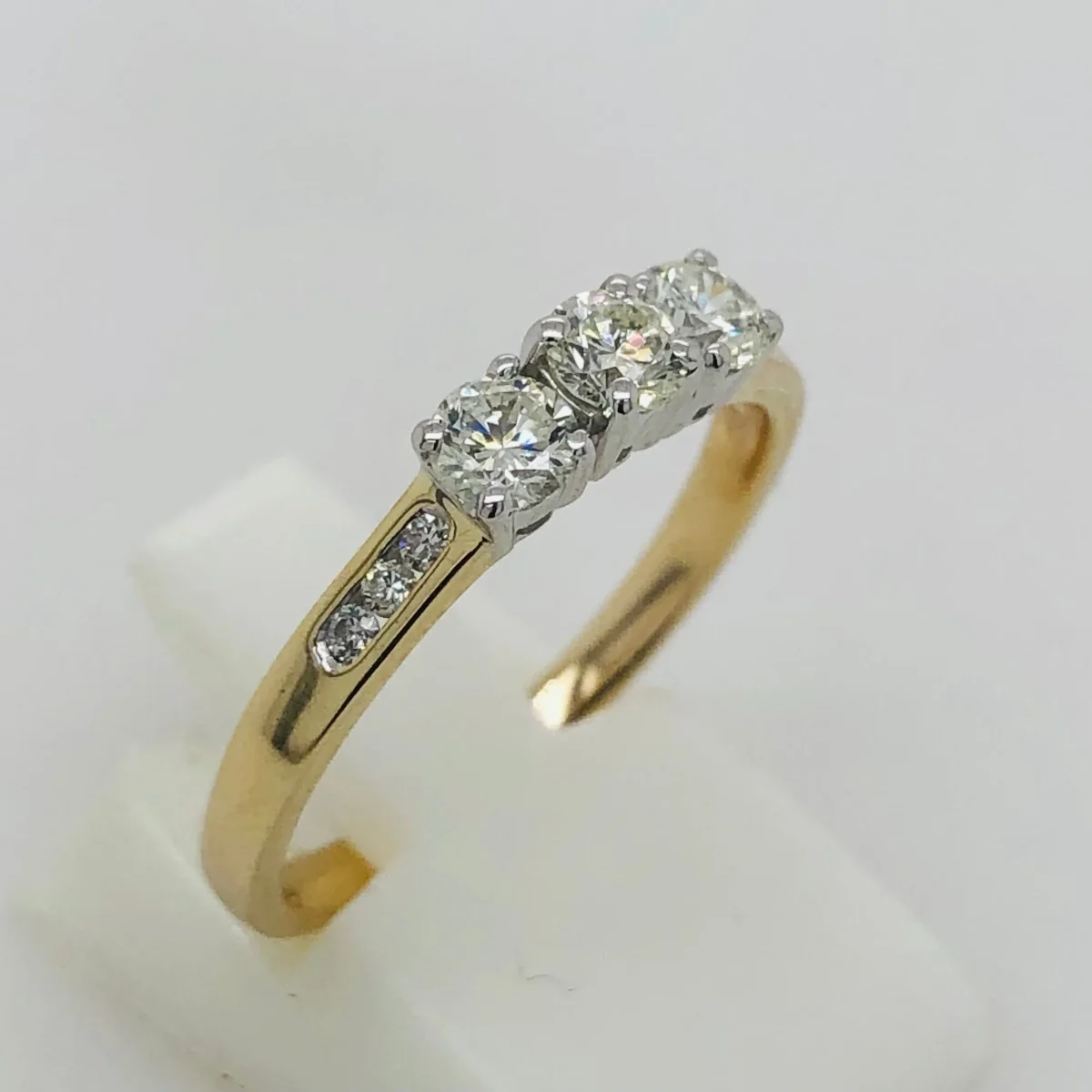 Three Stone Engagement Ring with 0.60 Carat TW of Diamonds in 9ct Yellow & White Gold