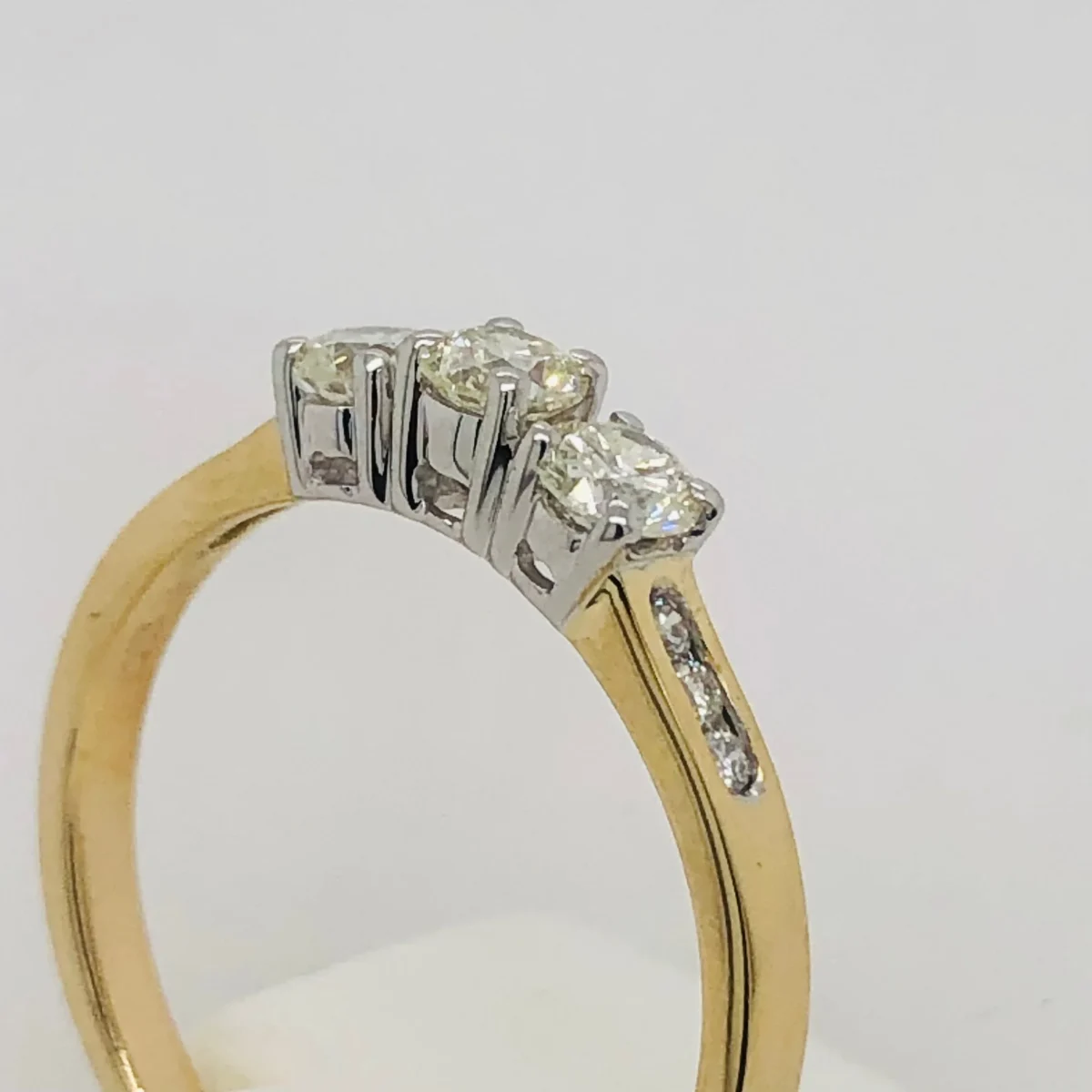 Three Stone Engagement Ring with 0.60 Carat TW of Diamonds in 9ct Yellow & White Gold