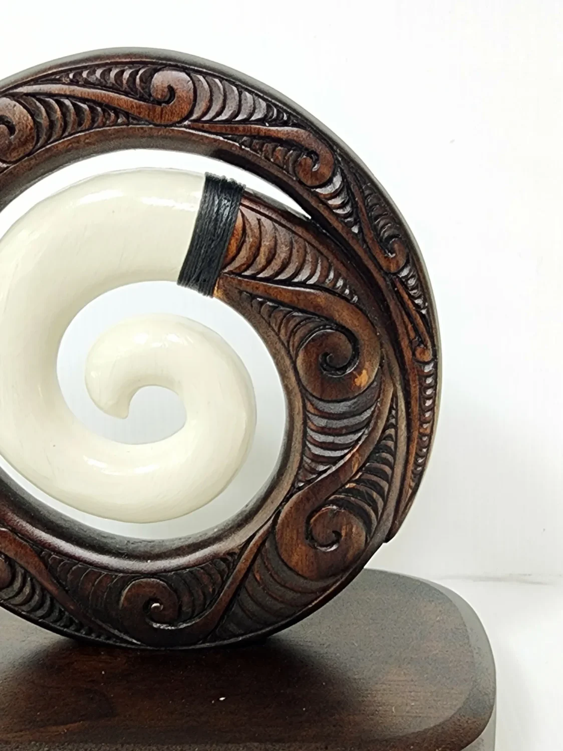 Wooden Carved Koru with White Resin on Base 175mm High