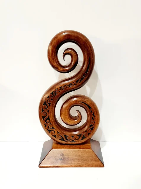 Wooden Carved Large Maori Carved Double Koru and Laser Engraved Patterns on Stand