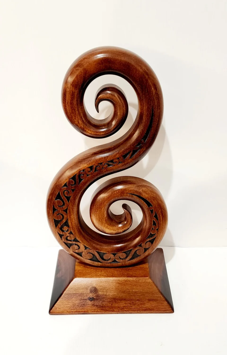 Wooden Carved Large Maori Carved Double Koru and Laser Engraved Patterns on Stand