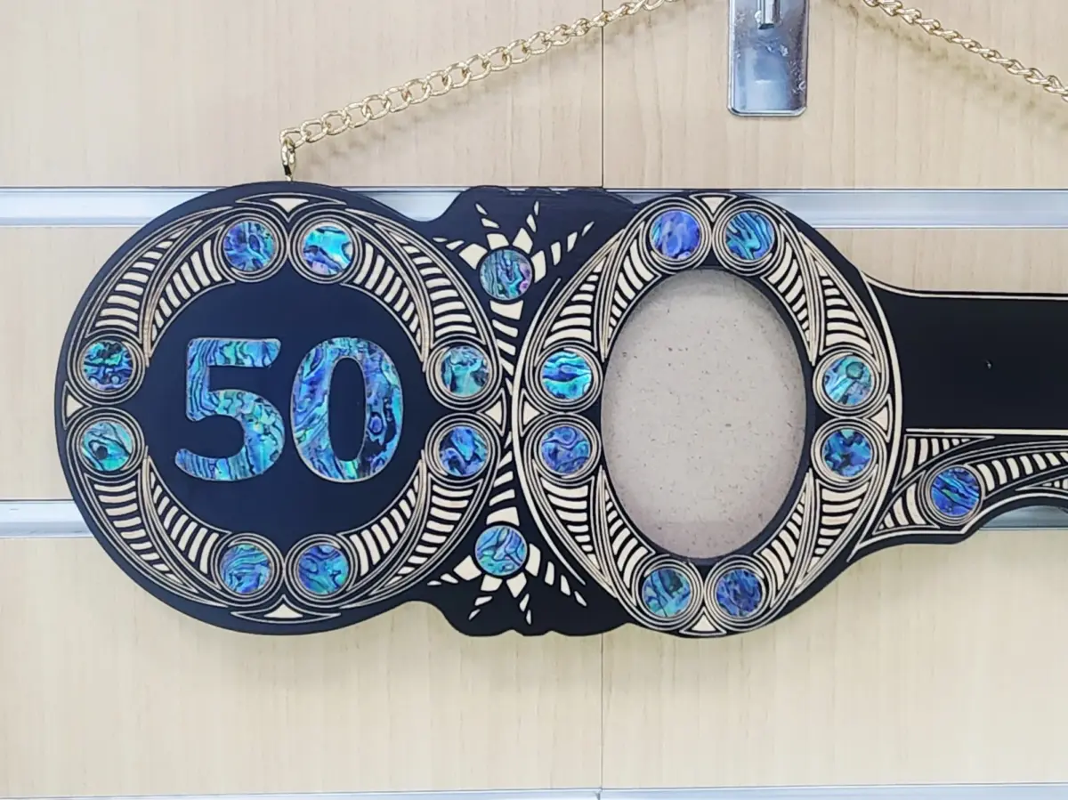 50th Birthday Māori Design Wooden Key – Pāua Shell Inlay "50" with 22 Pāua Shell Eyes - S19BLK