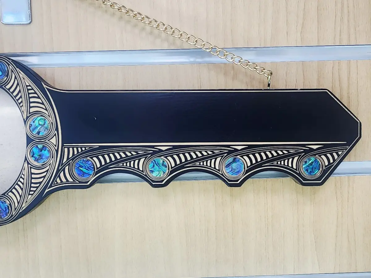50th Birthday Māori Design Wooden Key – Pāua Shell Inlay "50" with 22 Pāua Shell Eyes - S19BLK