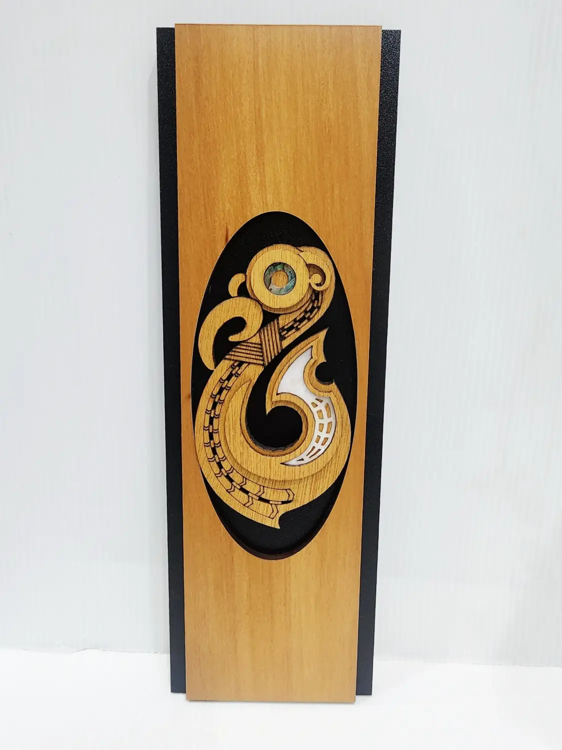 Māori Hei Matau Fish Hook Wooden Wall Art Panel – Rimu Finish with Pāua Shell Detail - WPHK