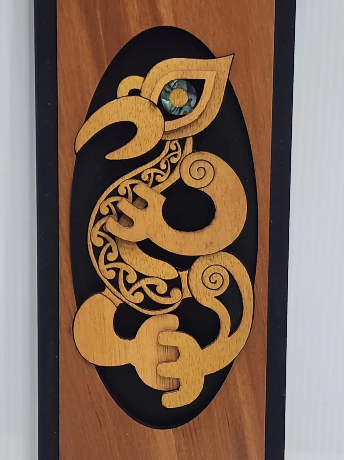 Māori Manaia Guardian Spirit Wooden Wall Art Panel – Rimu Finish with Pāua Shell Detail - WPMA