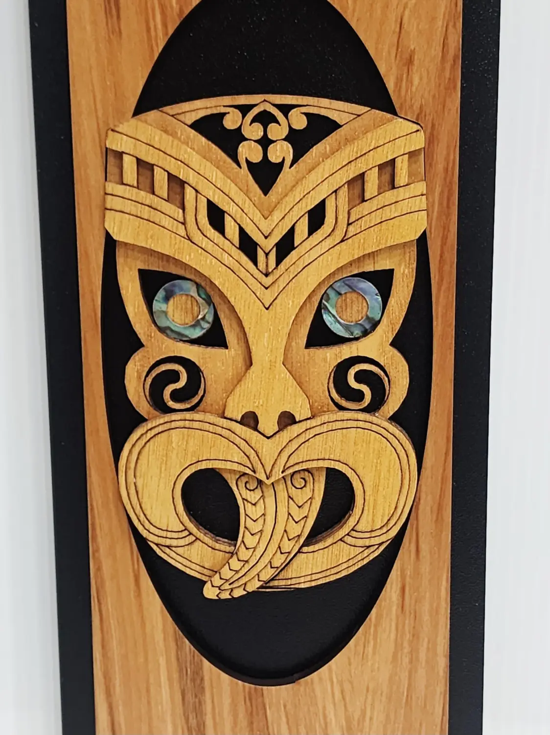 Māori Wheku Tiki Face Wooden Wall Art Panel – Rimu Finish with Pāua Shell Eyes - WPWH