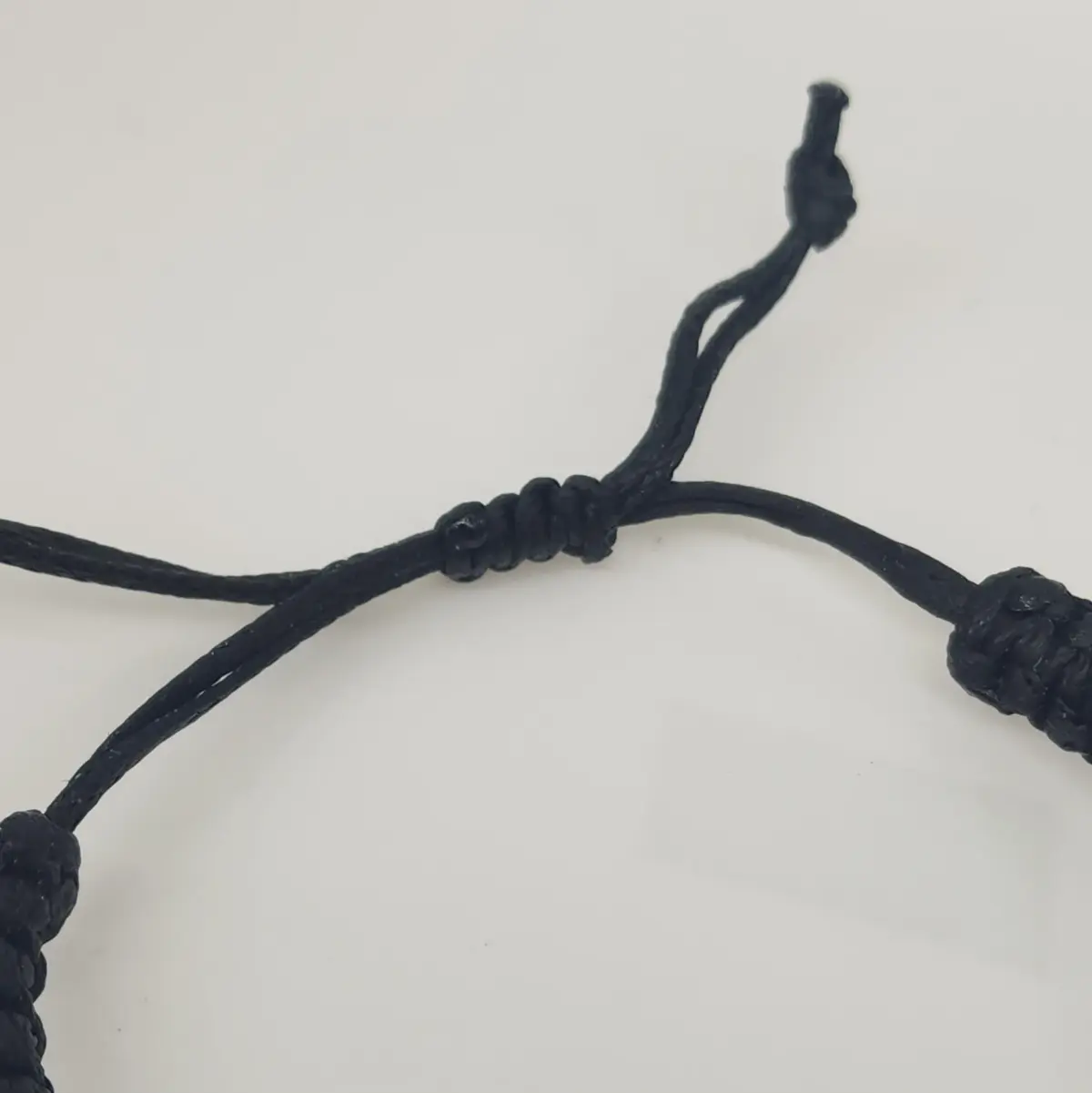 Natural New Zealand Greenstone Oval Polished Disc Bracelet – 45mm x 20mm | Black Braided Adjustable Cord