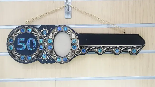 50th Birthday Māori Design Wooden Key – Pāua Shell Inlay "50" with 22 Pāua Shell Eyes - S19BLK
