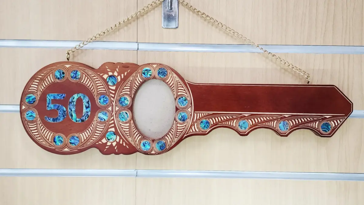 50th Birthday Māori Design Wooden Key – Pāua Shell Inlay "50" with 22 Pāua Shell Eyes | Brown Finish - S22DB