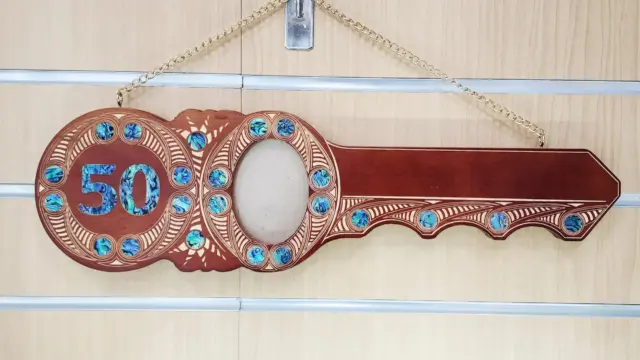 50th Birthday Māori Design Wooden Key – Pāua Shell Inlay "50" with 22 Pāua Shell Eyes | Brown Finish - S22DB